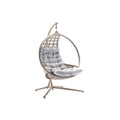 **Chaise suspendue en rotin avec coussin doux et design moderne**